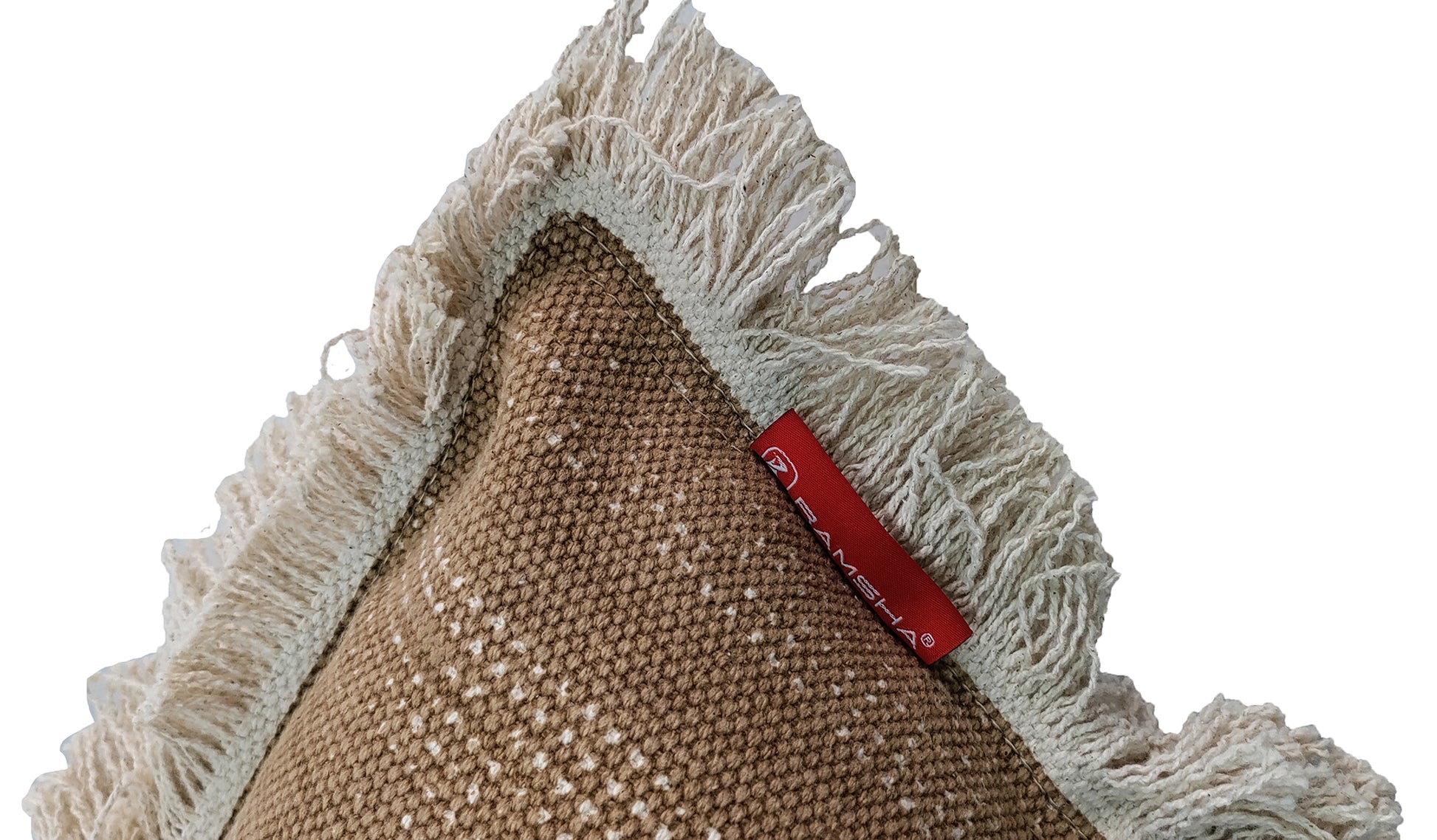 Close-up of the RAMSHA HOME Cotton Cushion With Fringes cs-141, showing a brown cotton corner with cream fringe and a red fabric tag against a white background.