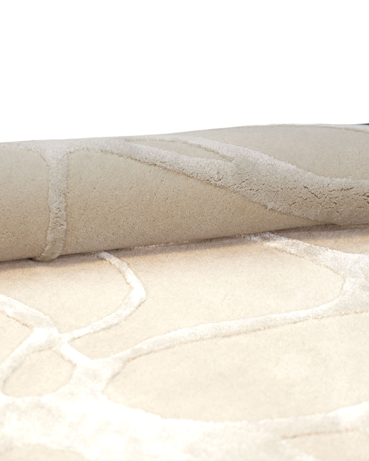 A close-up of the RAMSHA HOME Natural White Color Handmade Area Rug (HTWV-145, 200x300 cm) reveals its soft, subtle abstract pattern and textured design in gentle, neutral tones—an ideal modern area rug to complement contemporary interiors.