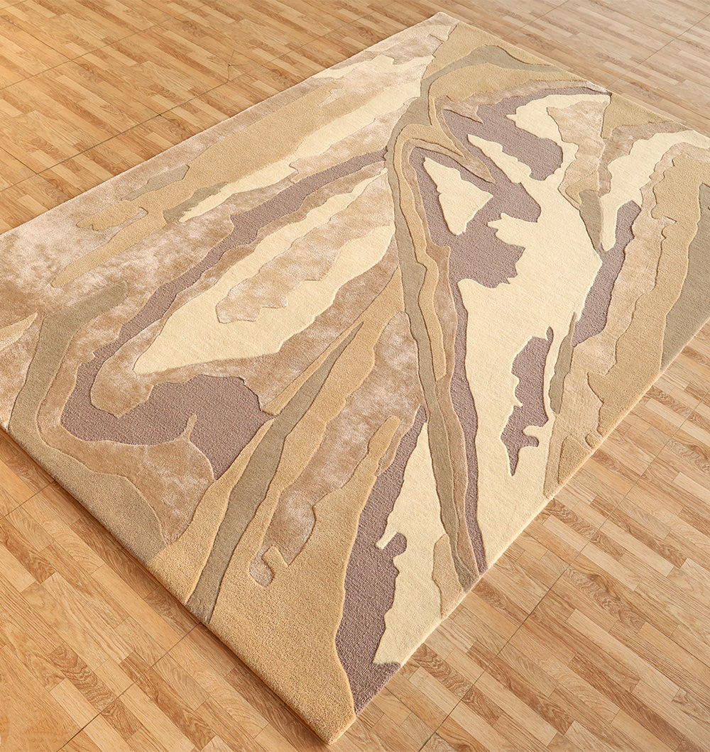 The RAMSHA HOME Abstract Wool & Viscose Handmade Carpet 200x300 – HTWV-179 features an organic beige and light brown pattern with flowing earth-tone lines, adding a serene touch to any light wood parquet floor.