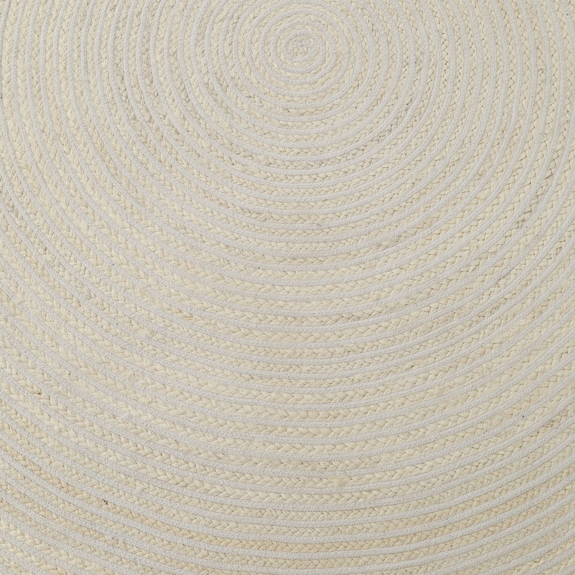 The Home Decor Round Jute Rug - BR 089 features a beige, braided design in concentric circles, creating a textured spiral pattern for a stylish flat surface.