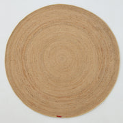The RAMSHA HOME Handmade Natural Color Braided Round Rug - BR 013 features a concentric circular pattern, crafted from natural fibers, displayed on a plain white background.