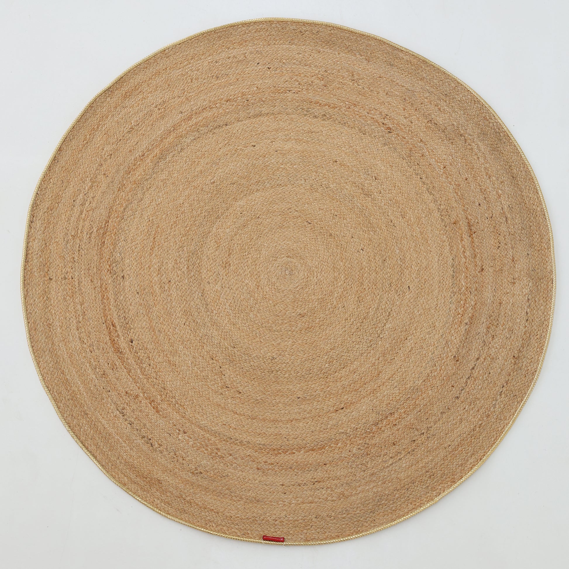 The RAMSHA HOME Handmade Natural Color Braided Round Rug - BR 013 features a concentric circular pattern, crafted from natural fibers, displayed on a plain white background.