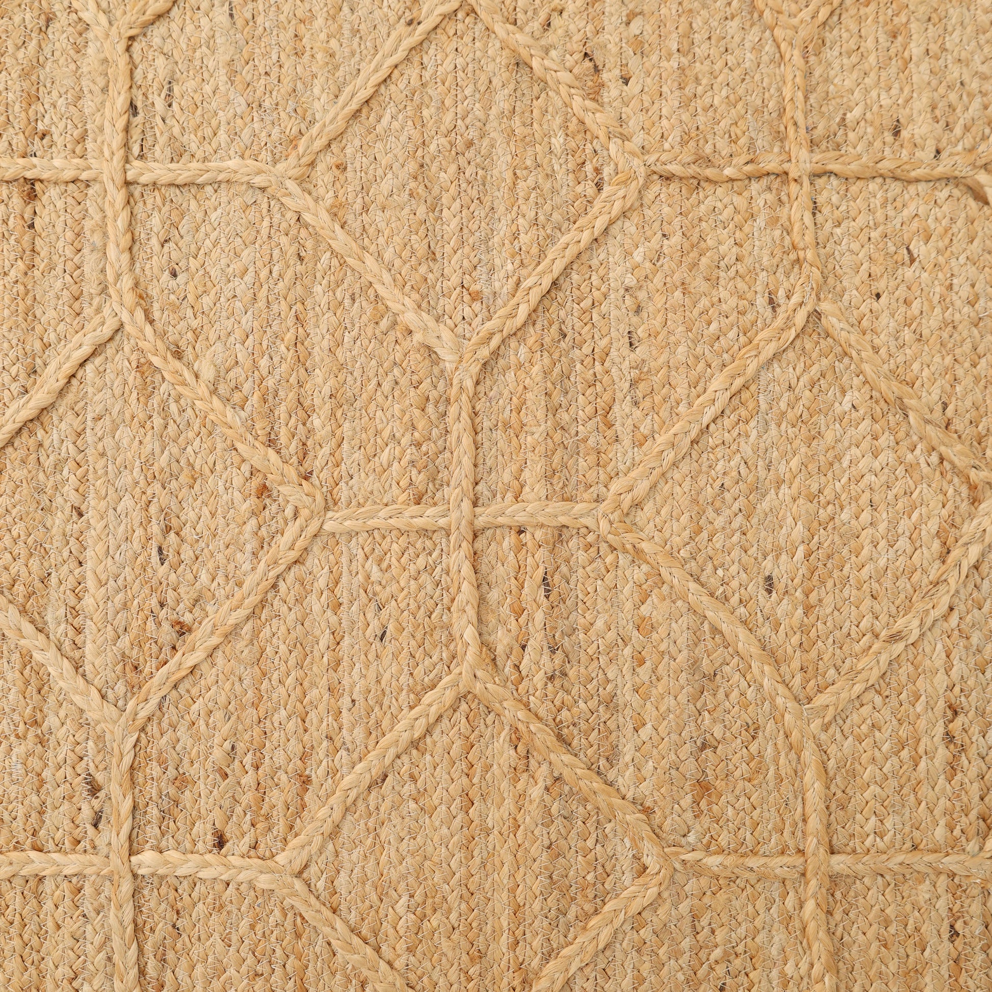 Close-up of the RAMSHA HOME Natural Color Dining Room Jute Area Braided Rug - BR 076, featuring a diamond pattern and textured finish in earthy beige—ideal for bringing warmth to modern interiors.