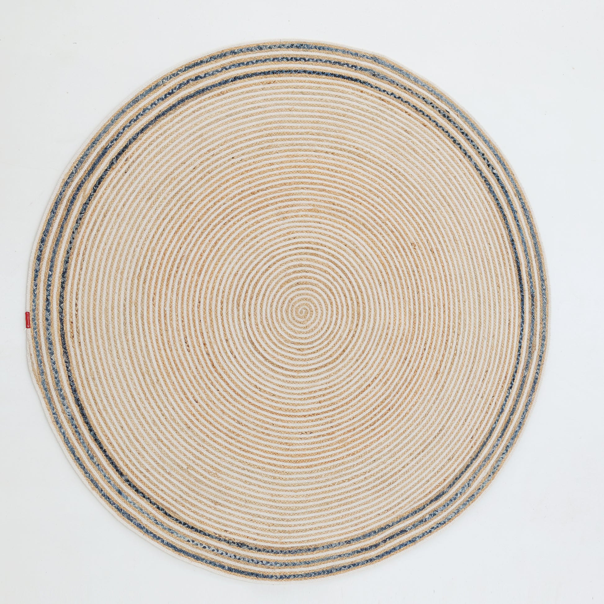 The RAMSHA HOME Creative Handcrafted Blue Border Braided Rug - BR 065 features concentric circular patterns and a blue decorative edge, adding texture and style to any space. Shown on a plain white background.