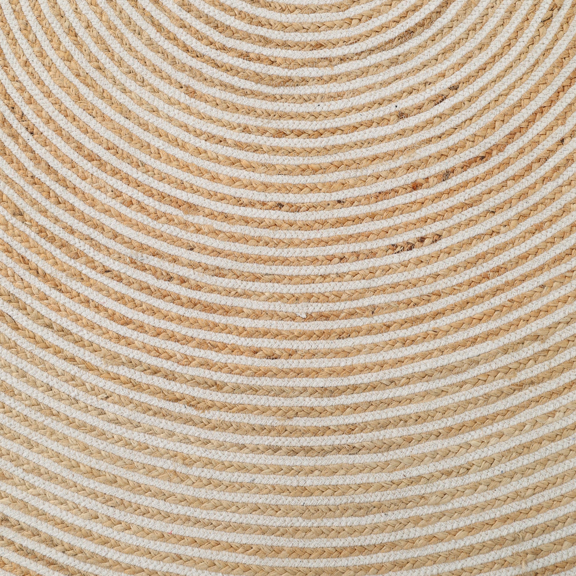 Close-up of the RAMSHA HOME Creative Handcrafted Blue Border Braided Rug - BR 065, featuring concentric rings and woven fibers in beige, white, and blue for a textured, symmetrical look that suits any space.