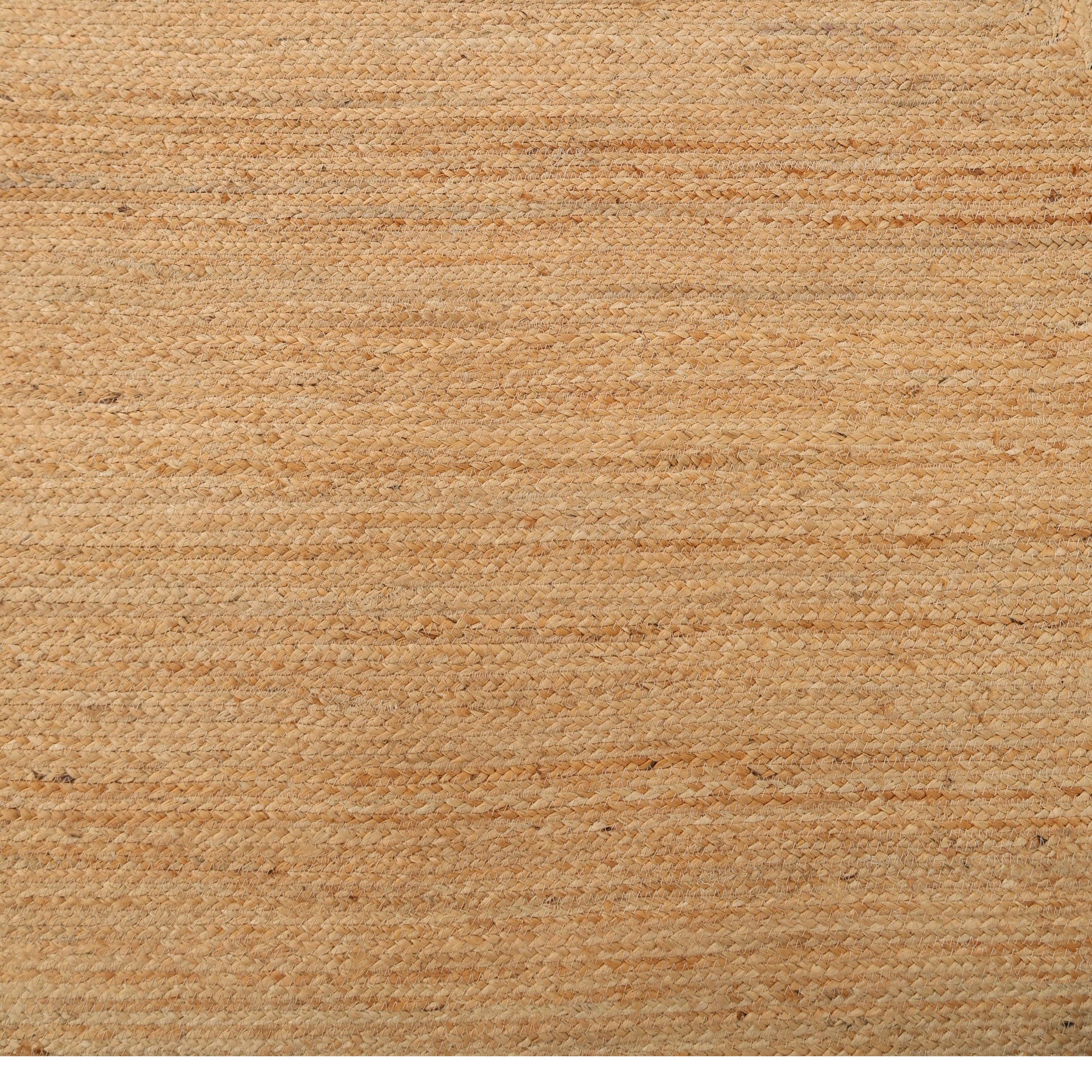 Close-up of the Handmade Natural Color Drawing Room Jute Floor Braided Rug - BR 046, showing its light brown tone, slightly rough texture, and subtle horizontal lines.