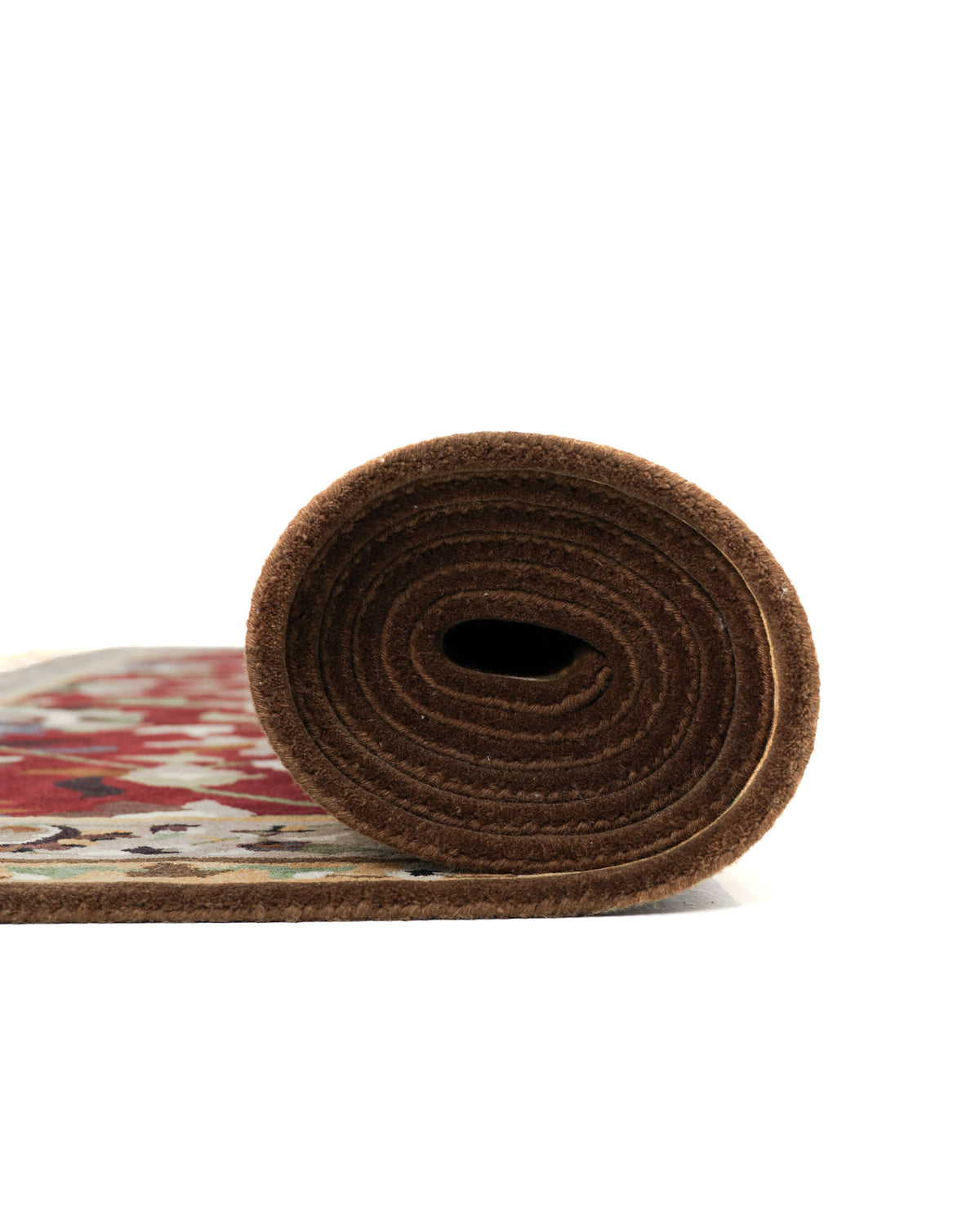 The RAMSHA HOME Wool & Cotton Handmade Area Rug HTW-08, featuring a traditional brown and red floral pattern, is displayed rolled up on a white background with its edge facing the camera.