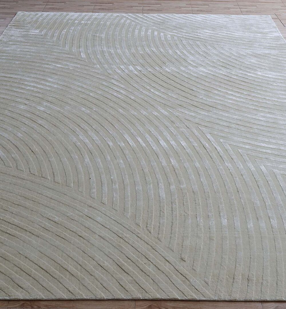 The Vibrant Multi Color Handmade Area Rug - HL 07 by RAMSHA HOME features a subtle, raised pattern of curved, concentric lines that adds texture and depth, creating a dynamic look on any light wooden floor.
