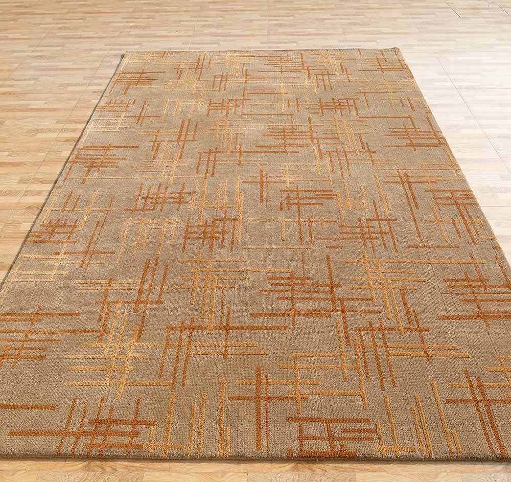 The Luxurious Multi Color Novara Rug - CMN 34 (200X300cm) by RAMSHA HOME features an abstract geometric design in orange and yellow on beige, adding a modern look to any light wood floor.