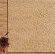 The RAMSHA HOME Modern Abstract 200x300 CM Rectangle Shaped Rug CMN 107, featuring a beige hue and raised swirling leaf pattern, is styled on a light wood floor with brown dried flowers in the lower left corner for added charm.