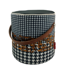 The RAMSHA HOME Leather Printed Pedestal Pouf With Leather Handle PF-025 features a cylindrical design, black and white houndstooth pattern, brown embroidery, leather handle, and dark lid—ideal for stylish home decor.