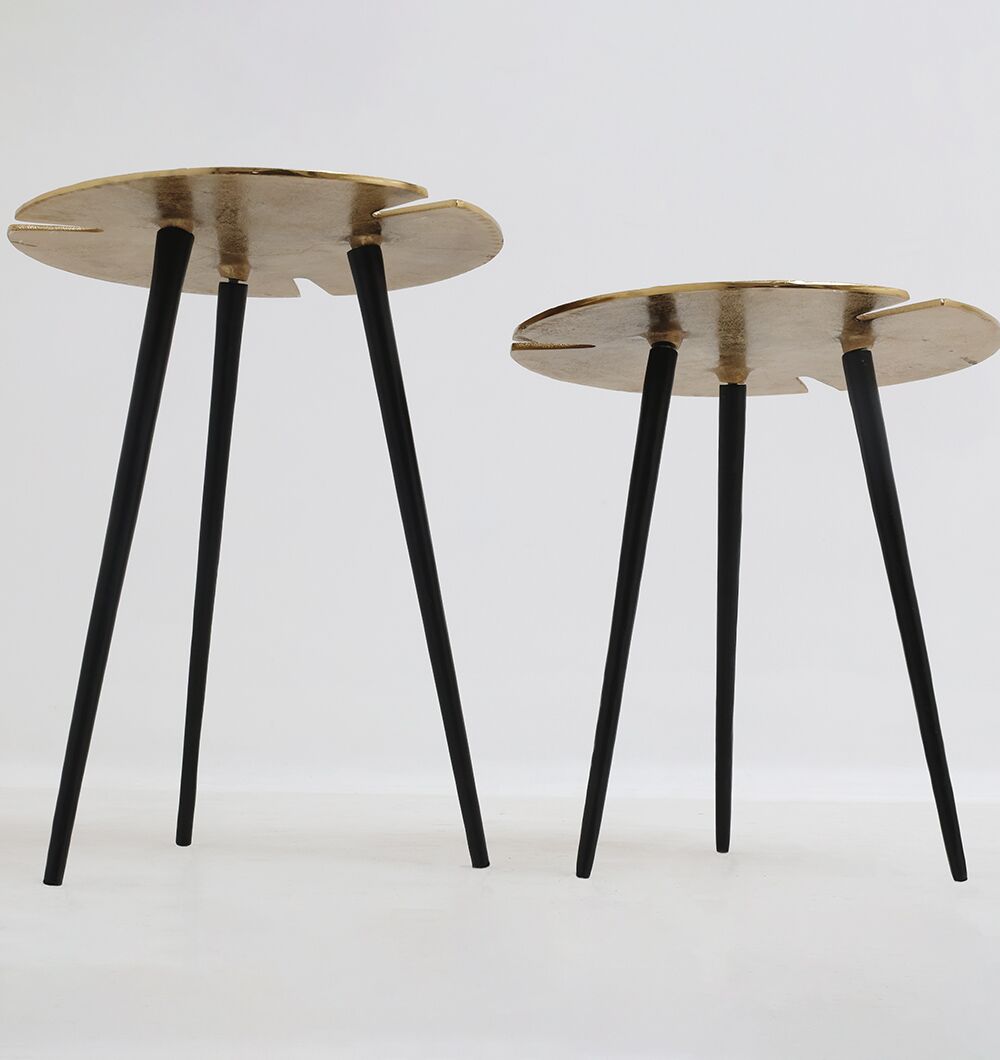 The RAMSHA HOME Lily Luxe Aluminum Accent Tables set includes two nesting tables in black and gold, each with organic edges and three tapered legs, bringing a modern touch to any space.