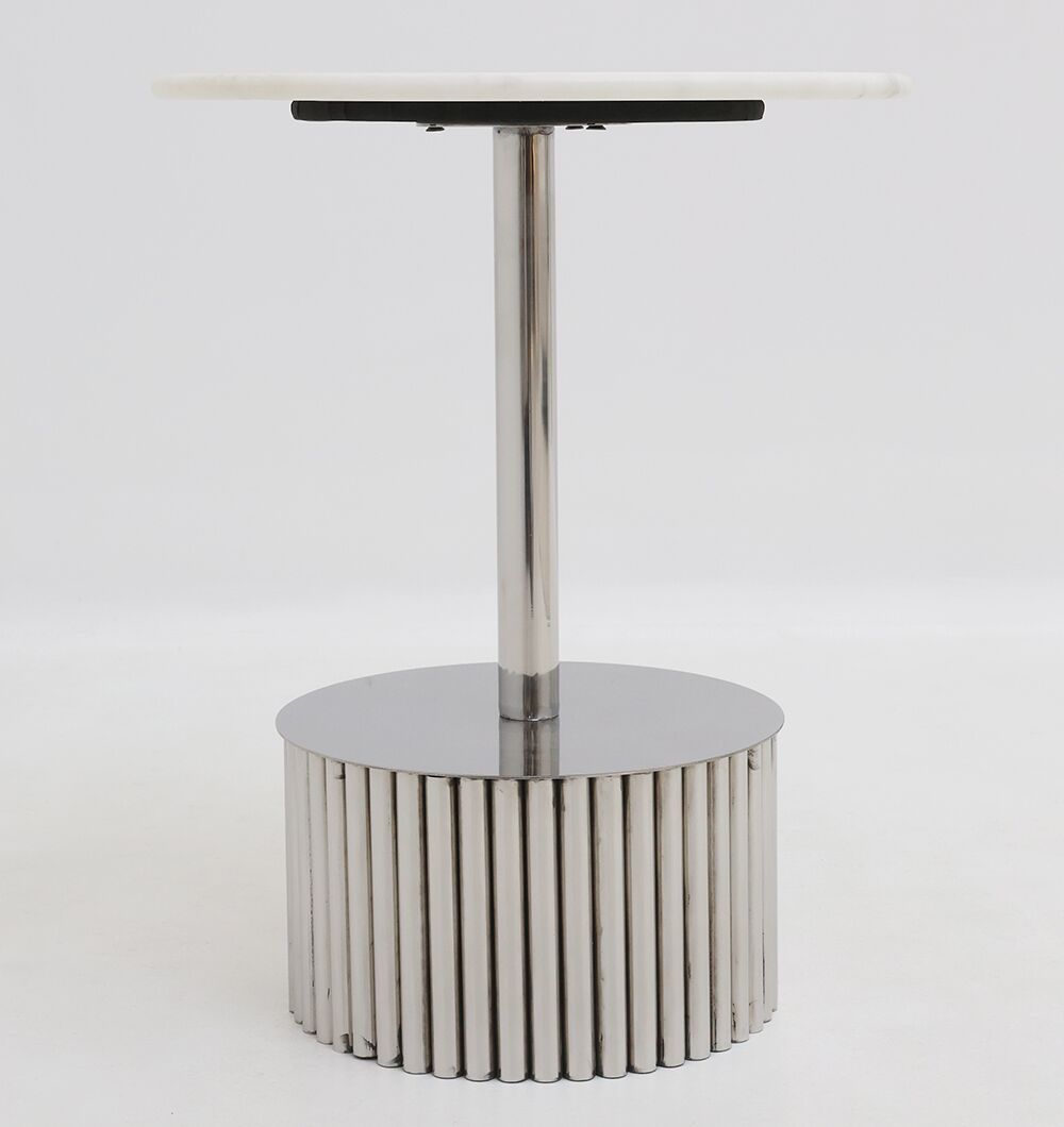 The Luna Polished Marble & Steel Side Table by RAMSHA HOME features a round white marble top, sleek metal stem, and a cylindrical base with vertical metallic ridges, shown against a plain white background.