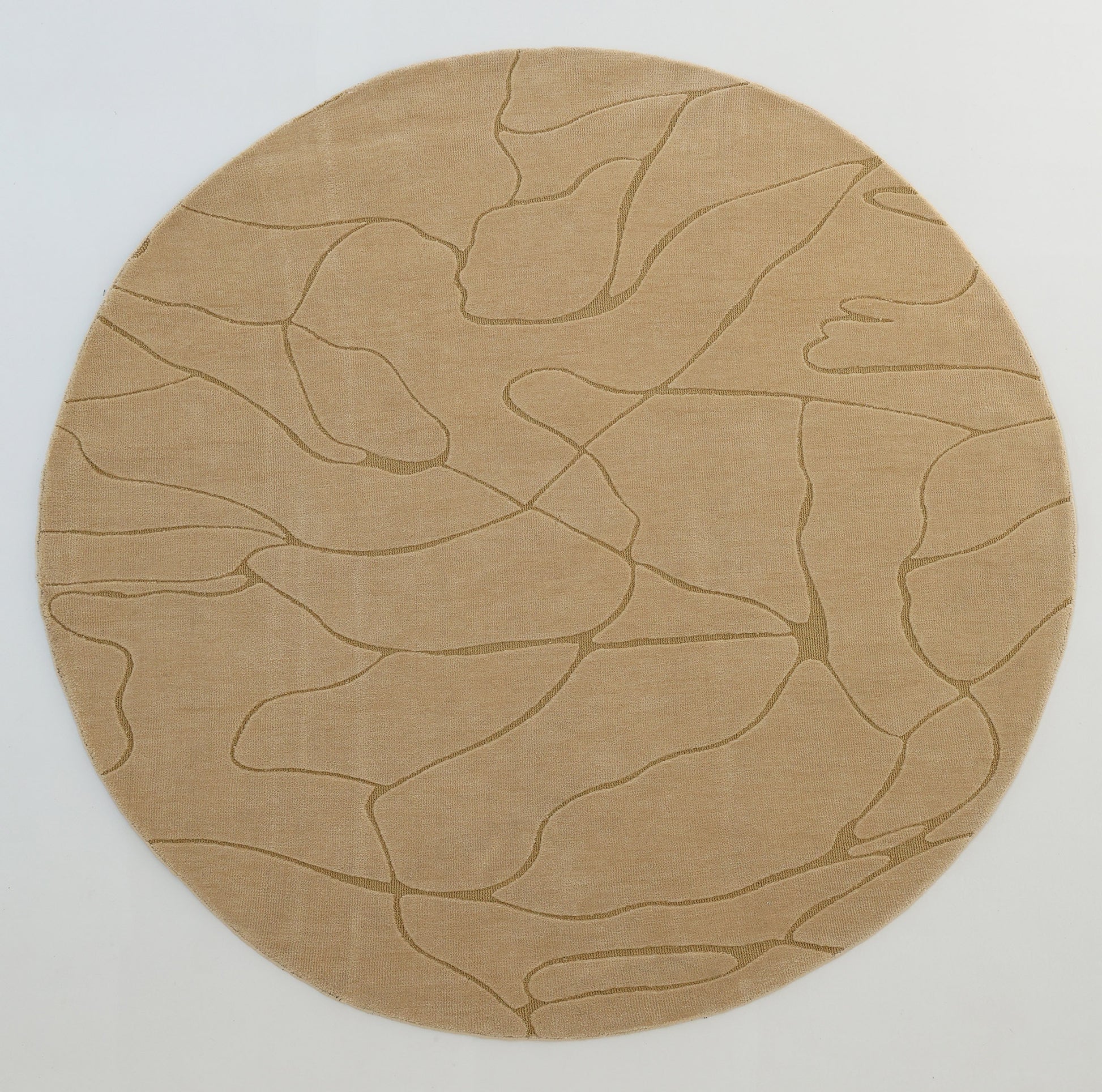 The RAMSHA HOME Modern Sand Color Round Abstract Rug CMN 125 features an elegant wavy line and subtle geometric patterns in beige on a white background, adding a contemporary touch to any space.