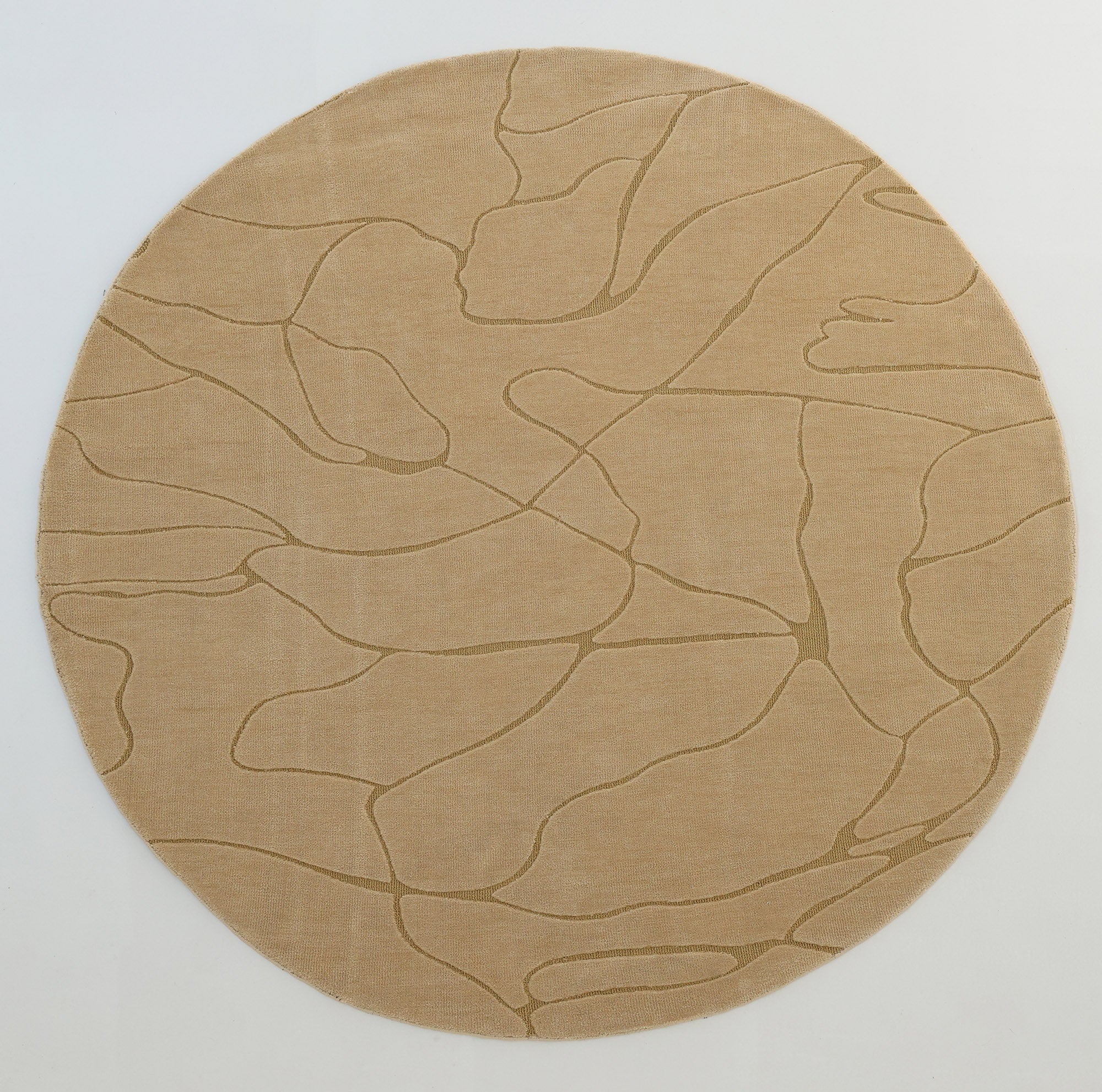 The RAMSHA HOME Modern Sand Color Round Abstract Rug CMN 125 features an elegant wavy line and subtle geometric patterns in beige on a white background, adding a contemporary touch to any space.