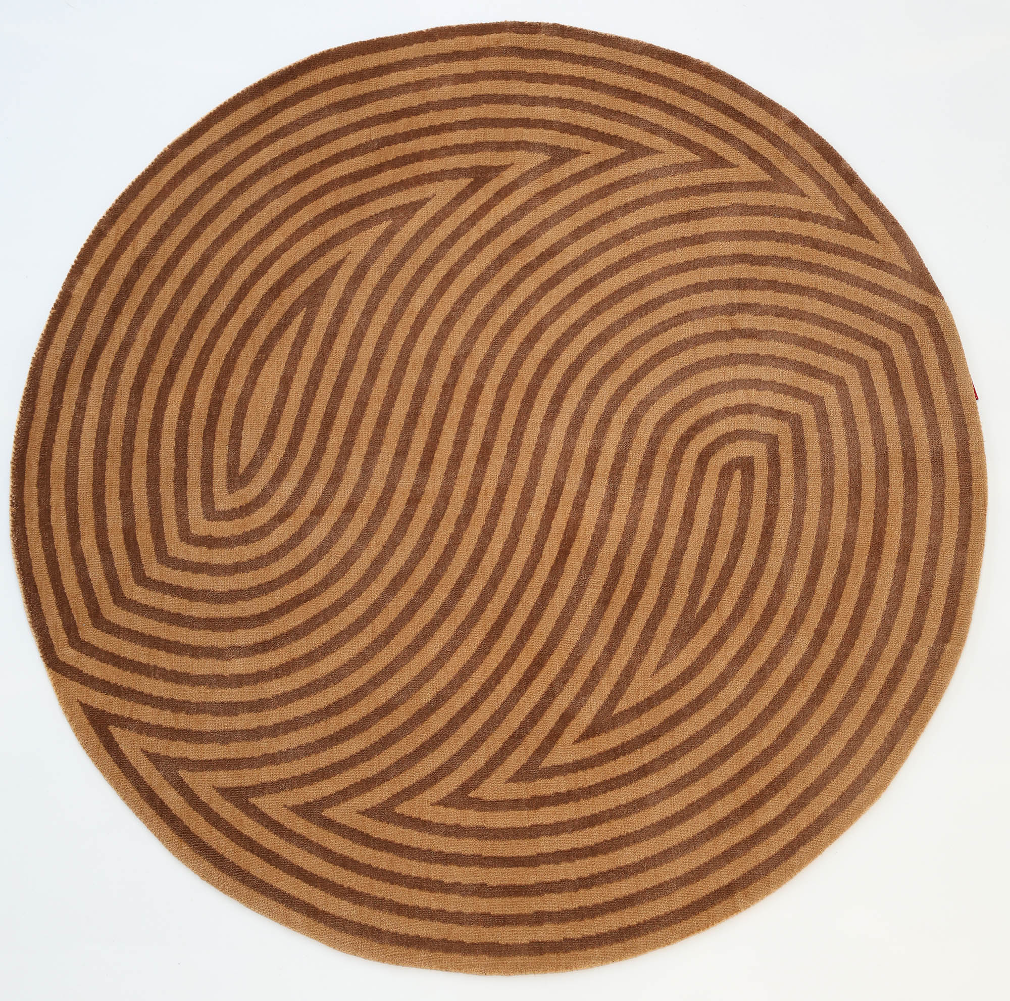 The RAMSHA HOME Modern Brown Color Round Abstract Rug CMN 130 features geometric concentric lines in a maze-like pattern on white, making it a striking addition to any contemporary space.