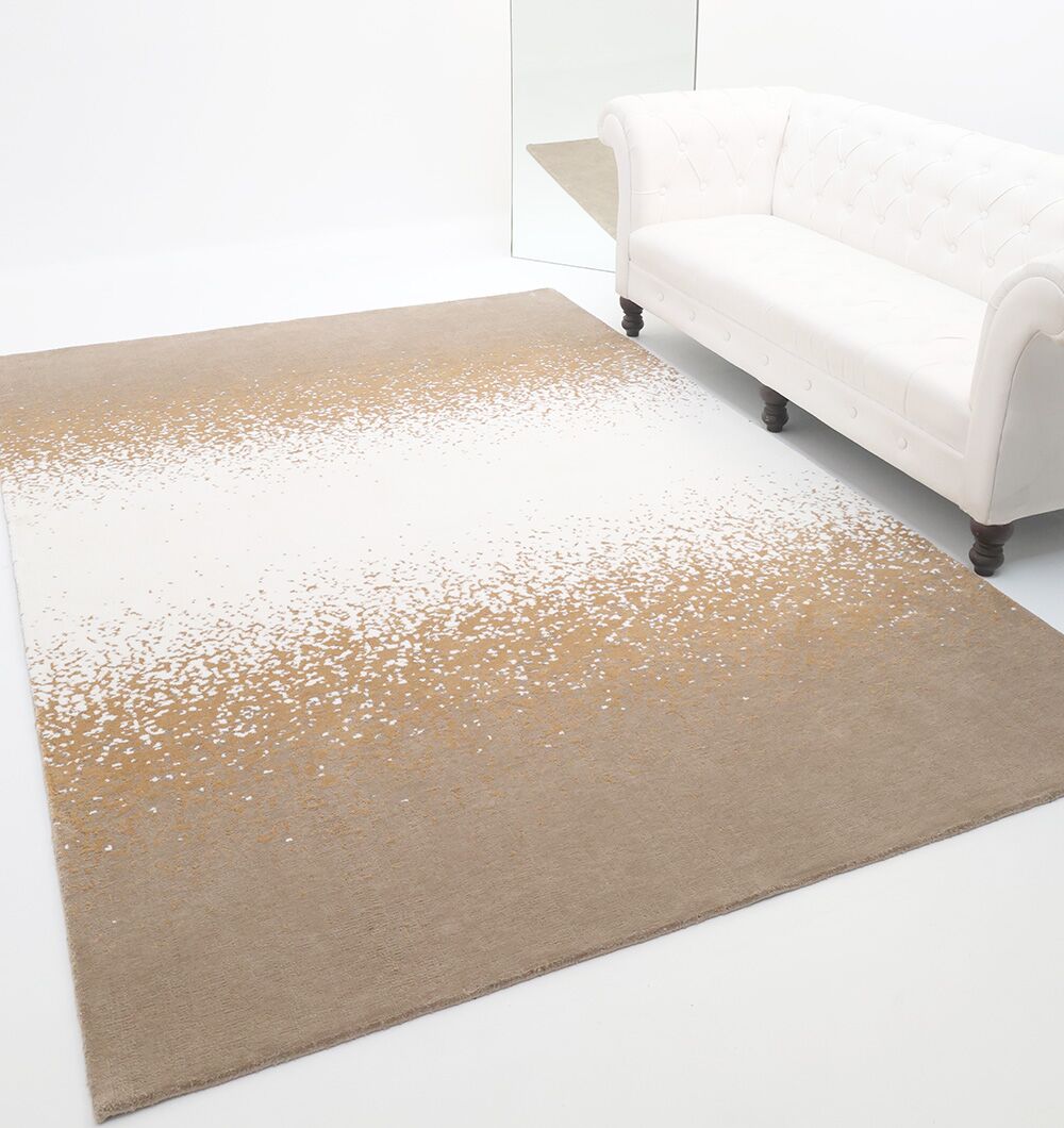 The RAMSHA HOME Rectangle Multi Color Rug - CMN 70 (200x300cm) with a speckled ombre design lies on a white floor beside a white tufted sofa, while a mirror behind the sofa reflects this stylish arrangement.