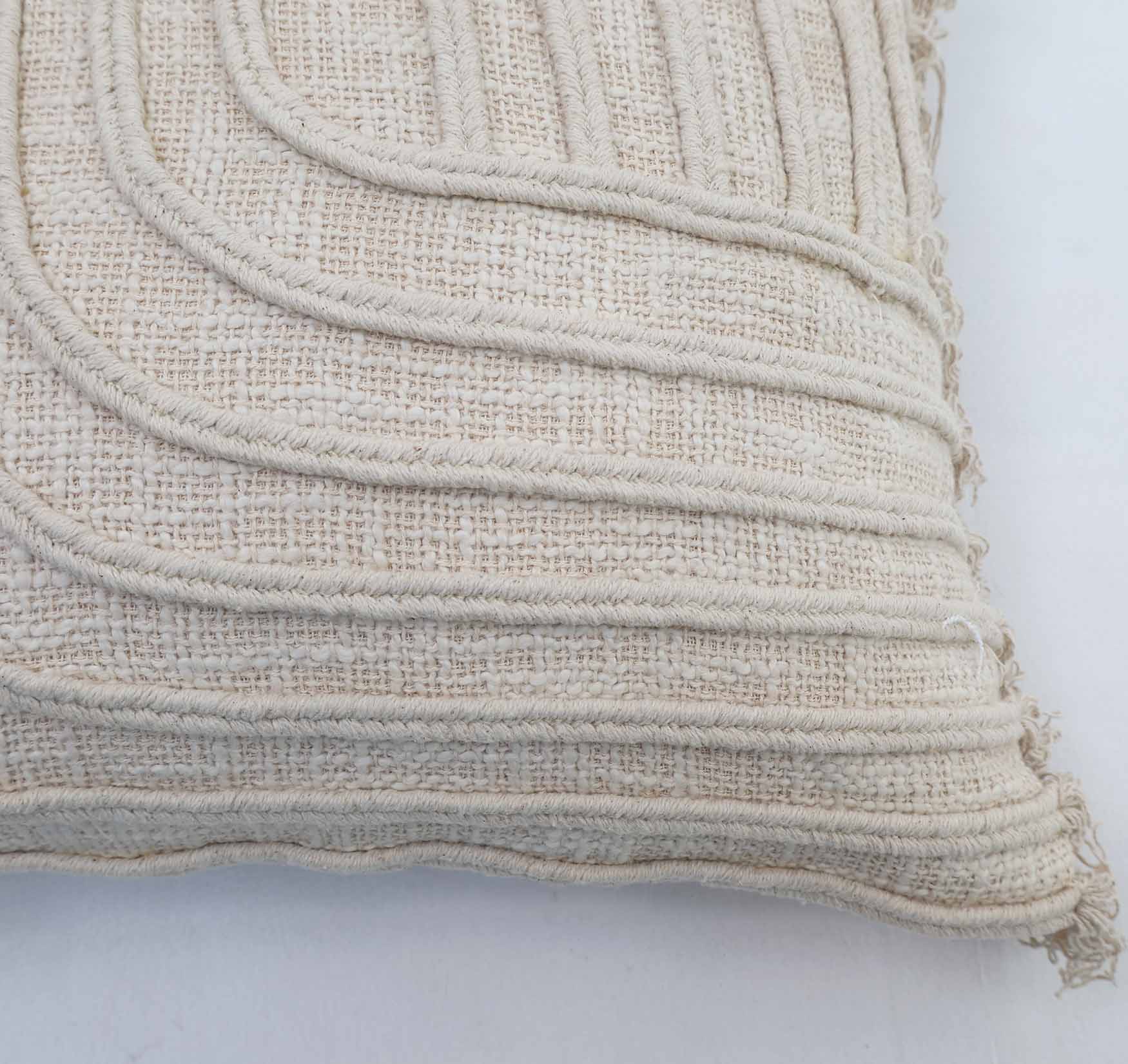 The Ramsha Home Natural Color Cushion - CS 295 (45x45cm) features raised, curved embroidered lines in a geometric pattern on woven fabric. Shown on a white surface, this luxury cushion adds style to your home décor.