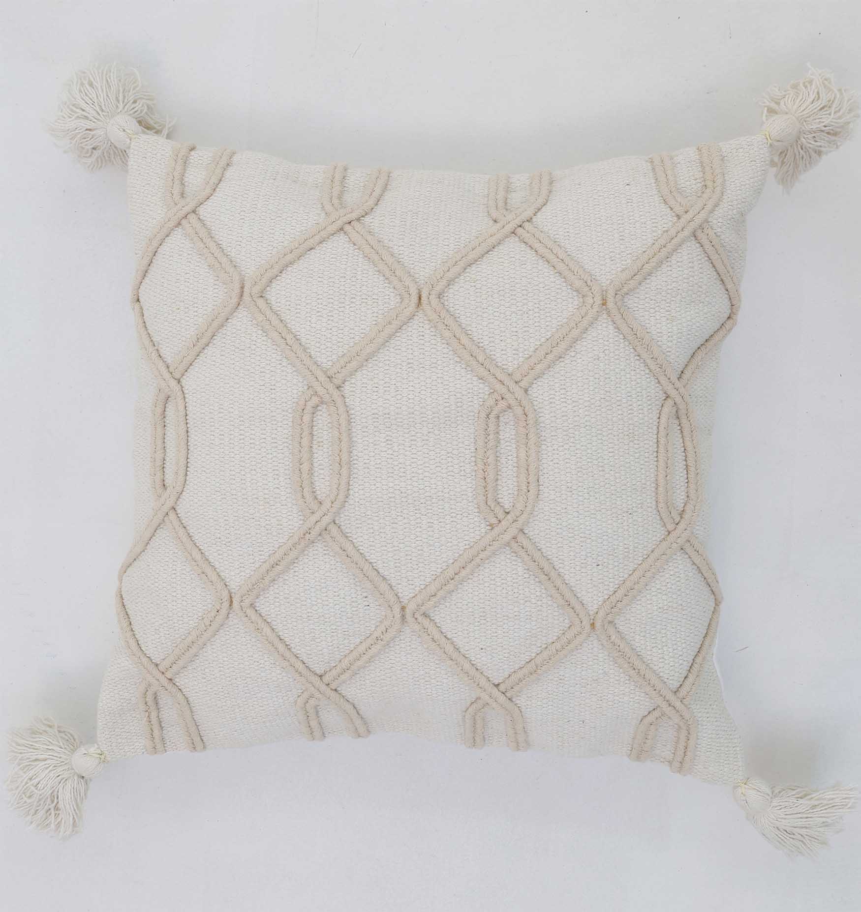 The Home Decor Tassel Cushion Natural & White Color - CS 303 (45x45cm) by Ramsha Home features a woven cover with diamond patterns and corner tassels, making it a chic addition to modern or boho interiors.
