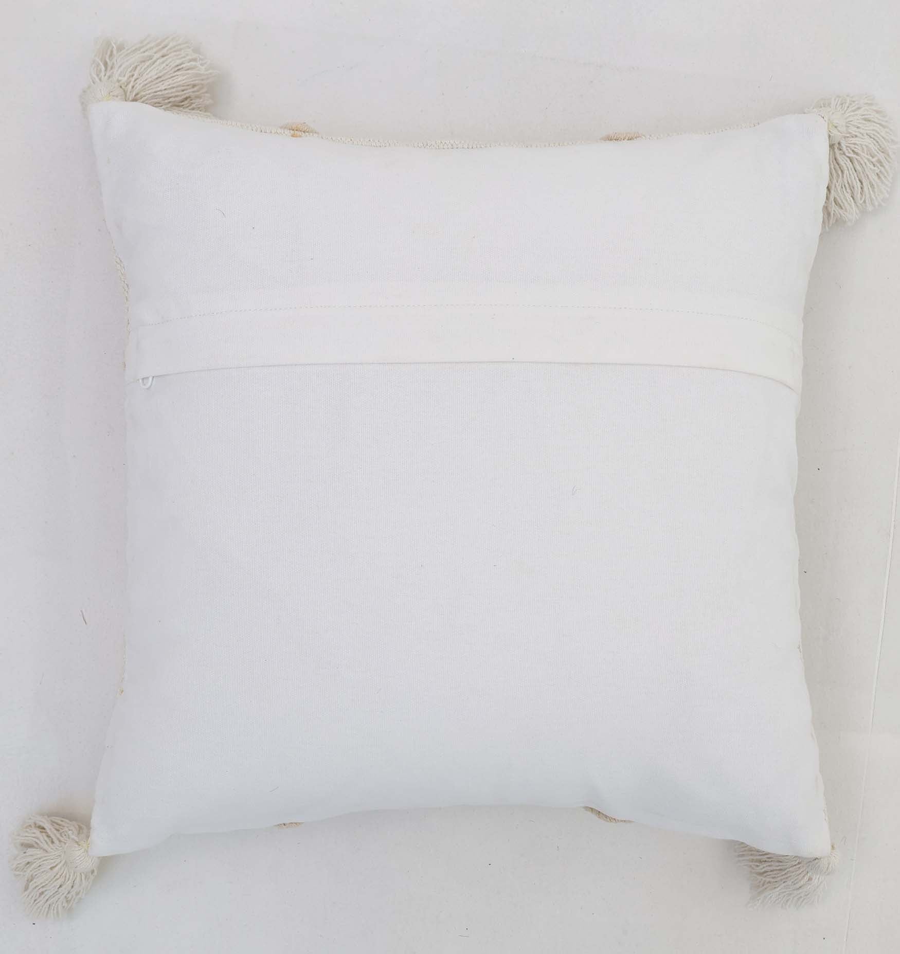 The Ramsha Home Decor Tassel Cushion (CS 303, 45x45cm) in natural & white features a horizontal back seam and four beige tassels at each corner. This stylish cushion enhances your home decor and is shown on a white surface.