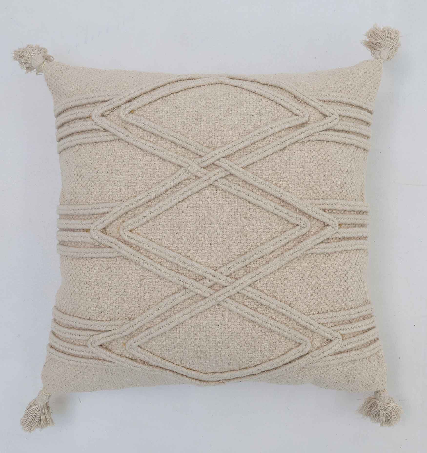 The Ramsha Home Decor Tassel Cushion Natural Color - CS 304 (45x45cm) features a cream tone with raised diamond and line patterns, tassels on each corner, and is displayed against a plain white background.