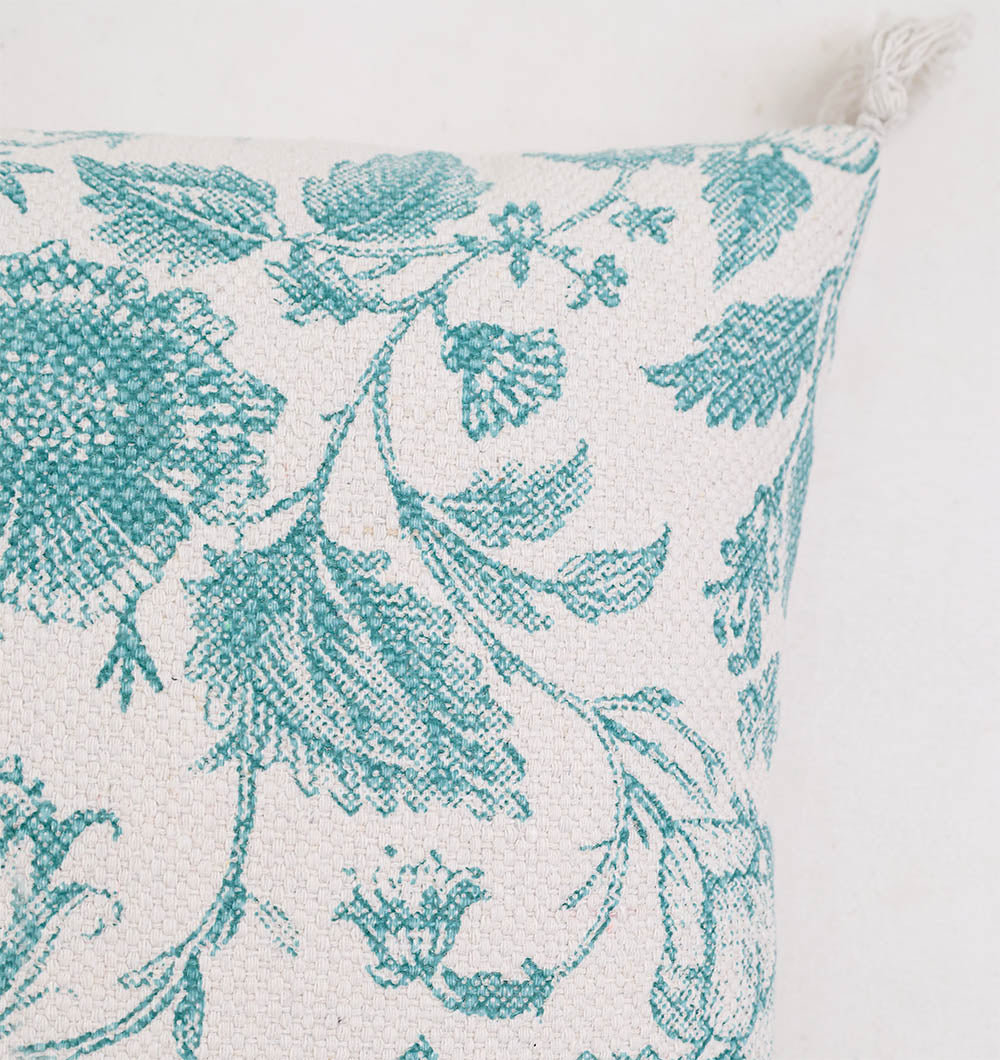 Close-up of the Ramsha Home Blue Color Floral Print Cotton Cushion 45x45 cm (CS 317)—a stylish piece featuring intricate blue floral designs and a tassel, ideal for adding elegance to your home décor.