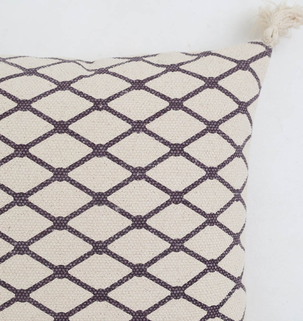 The Cream & Brown Printed Cotton Cushion 45x45 cm (CS 318) from Ramsha Home features a textured dark diamond lattice pattern with a tassel on one corner, shown against a white background.