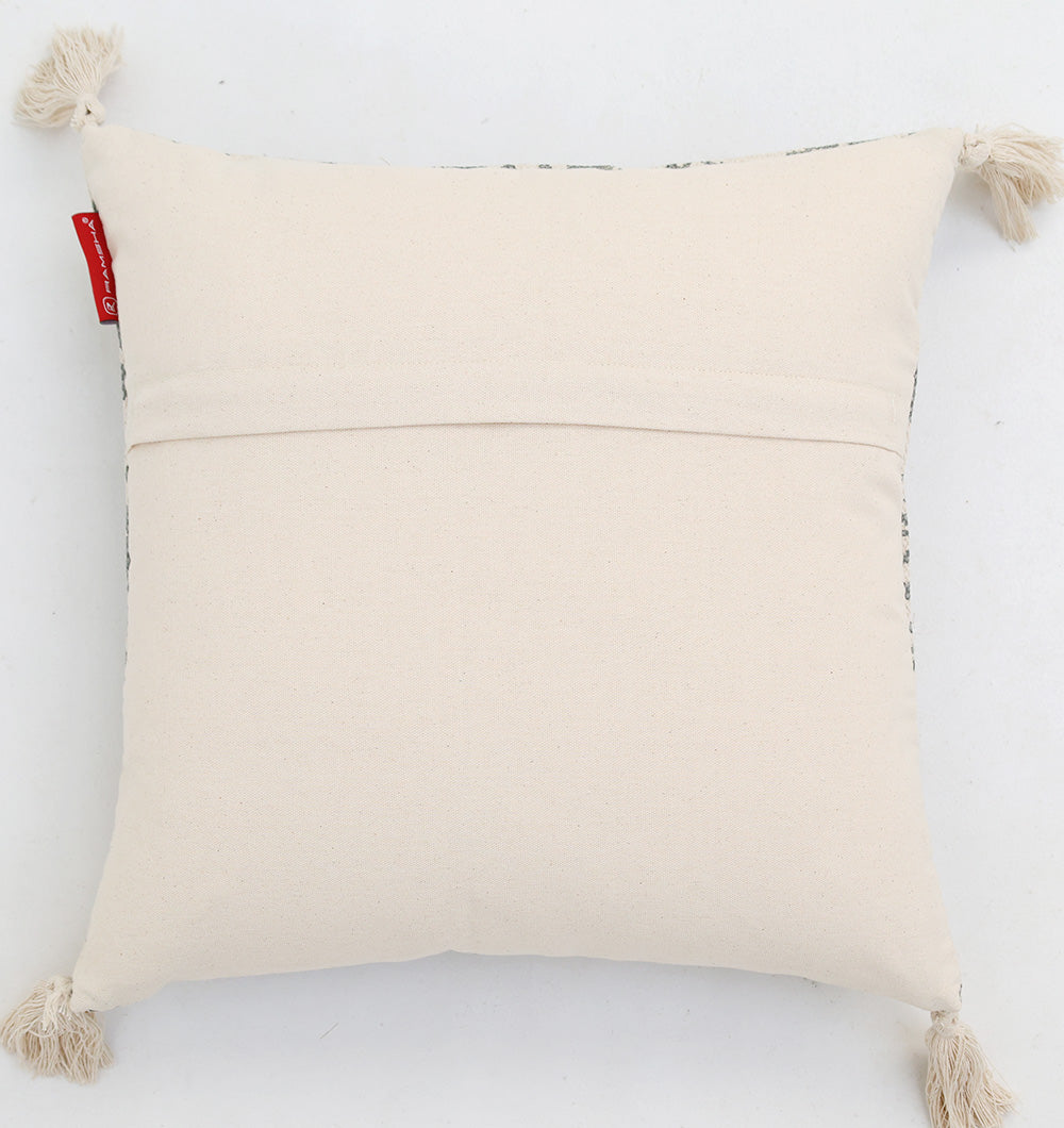 The White and Grey Printed Cotton Cushion 45x45 cm CS 324 by Ramsha Home is shown from the back with a red fabric tag on one side, tassels on each corner, placed against a white background.
