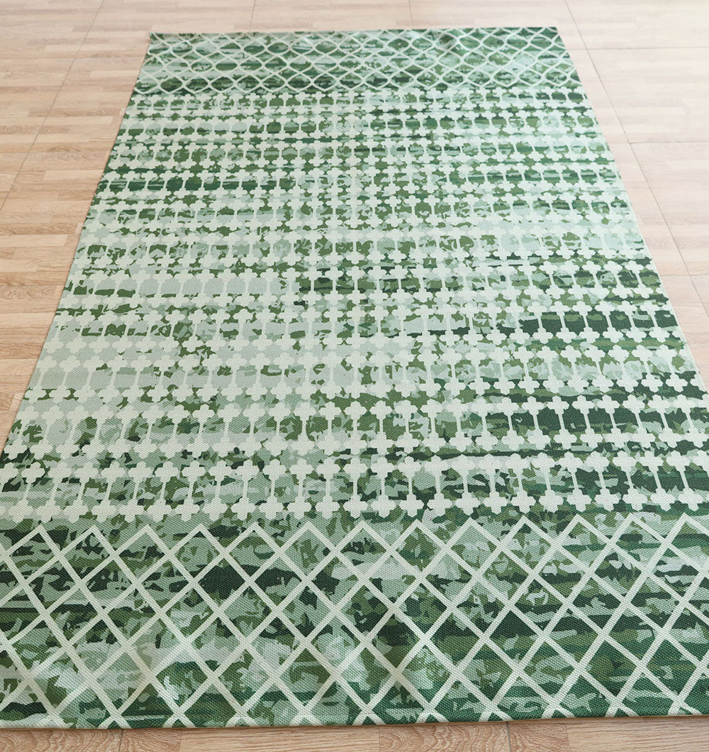 The Emerald Mosaic Digital Printed Rug for Living Room DD-046 by RAMSHA HOME features emerald green hues with geometric patterns, adding a modern touch to any light wood floor.