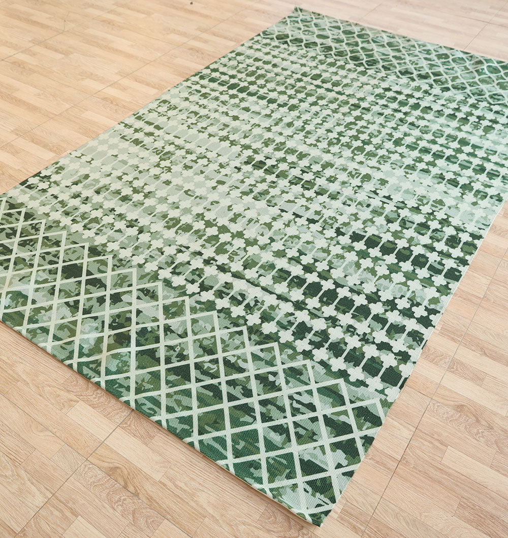 The RAMSHA HOME Emerald Mosaic Digital Printed Rug for Living Room DD-046 displays a mix of lattice and geometric designs in varying greens and white, creating a modern gradient effect perfect for light wood floors.