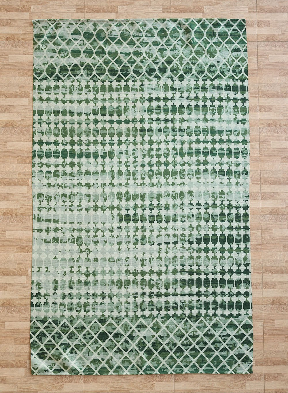 The RAMSHA HOME Emerald Mosaic Digital Printed Rug for Living Room DD-046 features geometric lattice and dotted designs in varying emerald green shades, adding modern flair to any space. Perfect for contemporary décor on light wood floors.