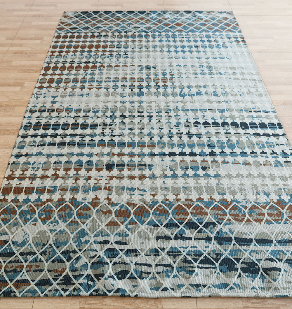 The RAMSHA HOME Modern Mosaic Digital Printed Rug for Living Room DD-047 features intersecting diamond shapes and abstract motifs in blue, brown, and beige, adding a stylish touch to any wooden floor.