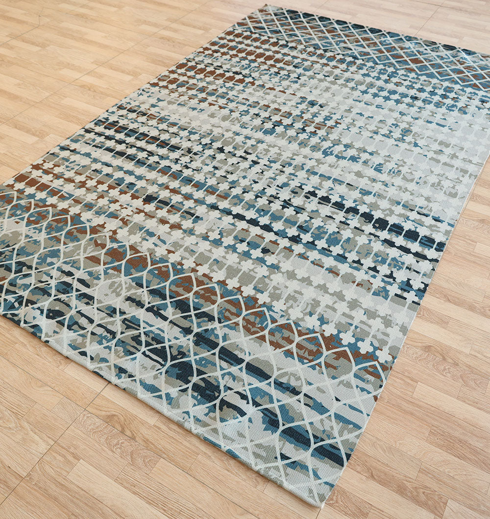 The RAMSHA HOME Modern Mosaic Digital Printed Rug for Living Room DD-047 features a contemporary pattern of intersecting lines, squares, and abstract shapes in blue, gray, and brown on a light wood floor.