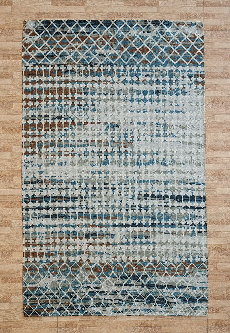 The RAMSHA HOME Modern Mosaic Digital Printed Rug for Living Room DD-047 features an abstract geometric pattern in blue, gray, and brown tones, displayed on a light wood floor with tile-style planks.