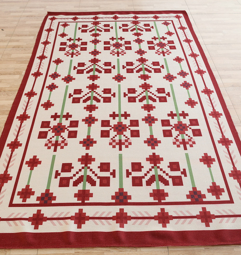 The RAMSHA HOME Traditional Red Floral Digital Printed Rug (Bohemian Area Rug DD-048) features a rectangular shape and folkloric geometric design in red, green, and white with symmetrical shapes and crosses framed by red borders.