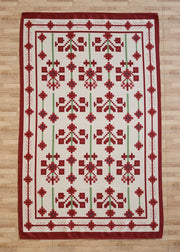 The RAMSHA HOME Traditional Red Floral Digital Printed Rug – Bohemian Area Rug DD-048 features a symmetrical geometric and floral pattern in red, green, and white, and is shown on a light wood floor.