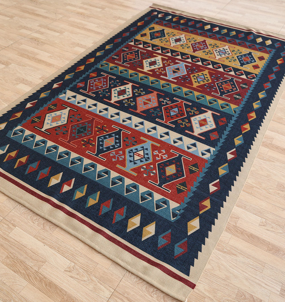The RAMSHA HOME Classic Heritage 145x240 cm Digital Printed Area Rug DD-051 features vibrant geometric diamonds and triangles in red, blue, yellow, white, and green, displayed on a light wooden floor.