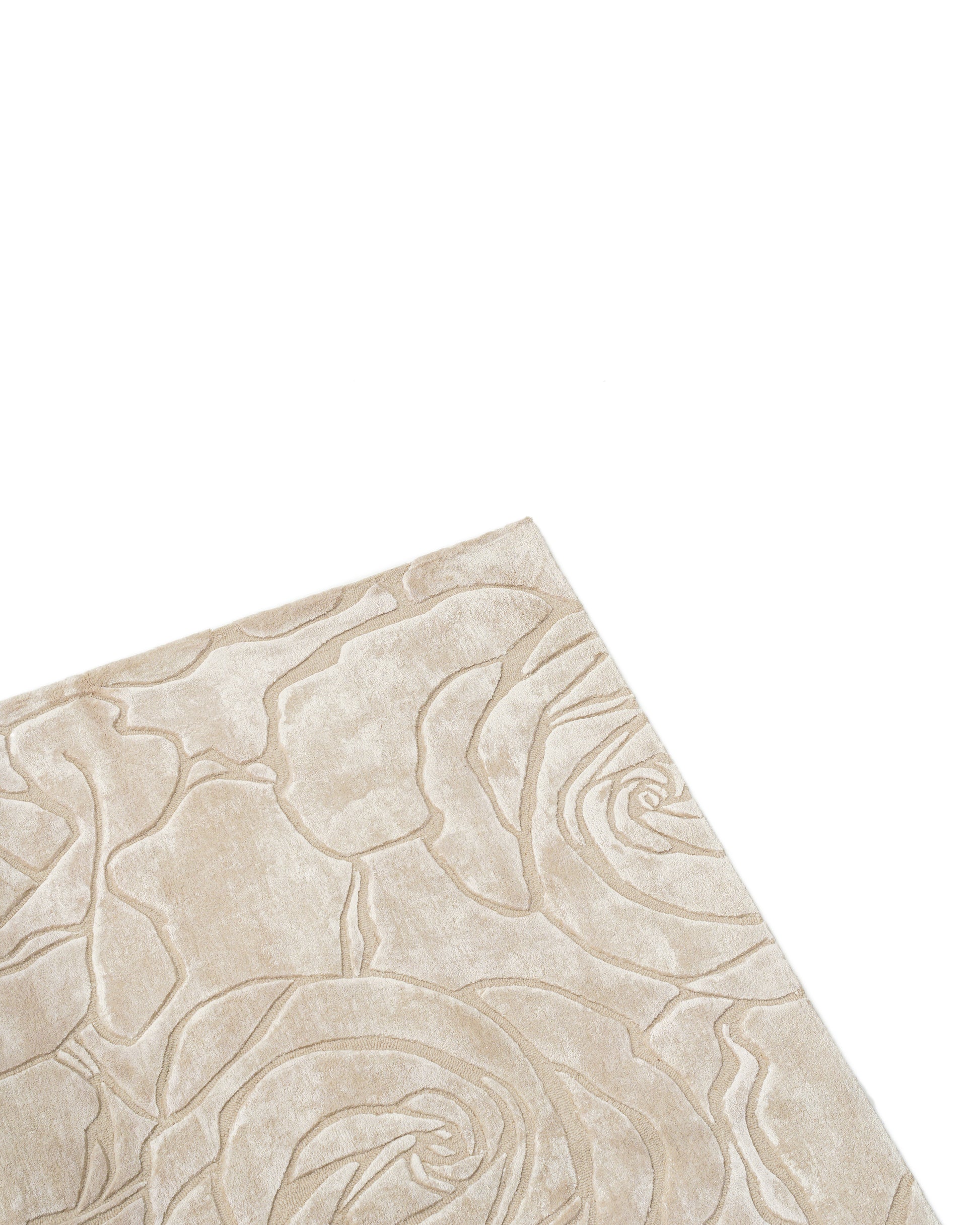 The RAMSHA HOME Home Decor Handmade Area Rug - HTWV-156 is featured in the lower left corner against a white background, showcasing its beige color, elegant carved texture, and subtle embossed rose pattern.