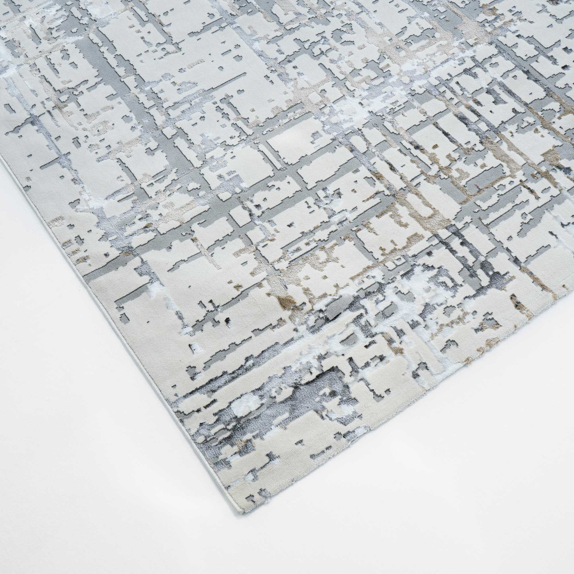 The RAMSHA HOME Cream Colored Geometry Turkish Carpet MZ24Z features a modern abstract geometric grid in gray, beige, and white tones on a light background with a stylish distressed look.