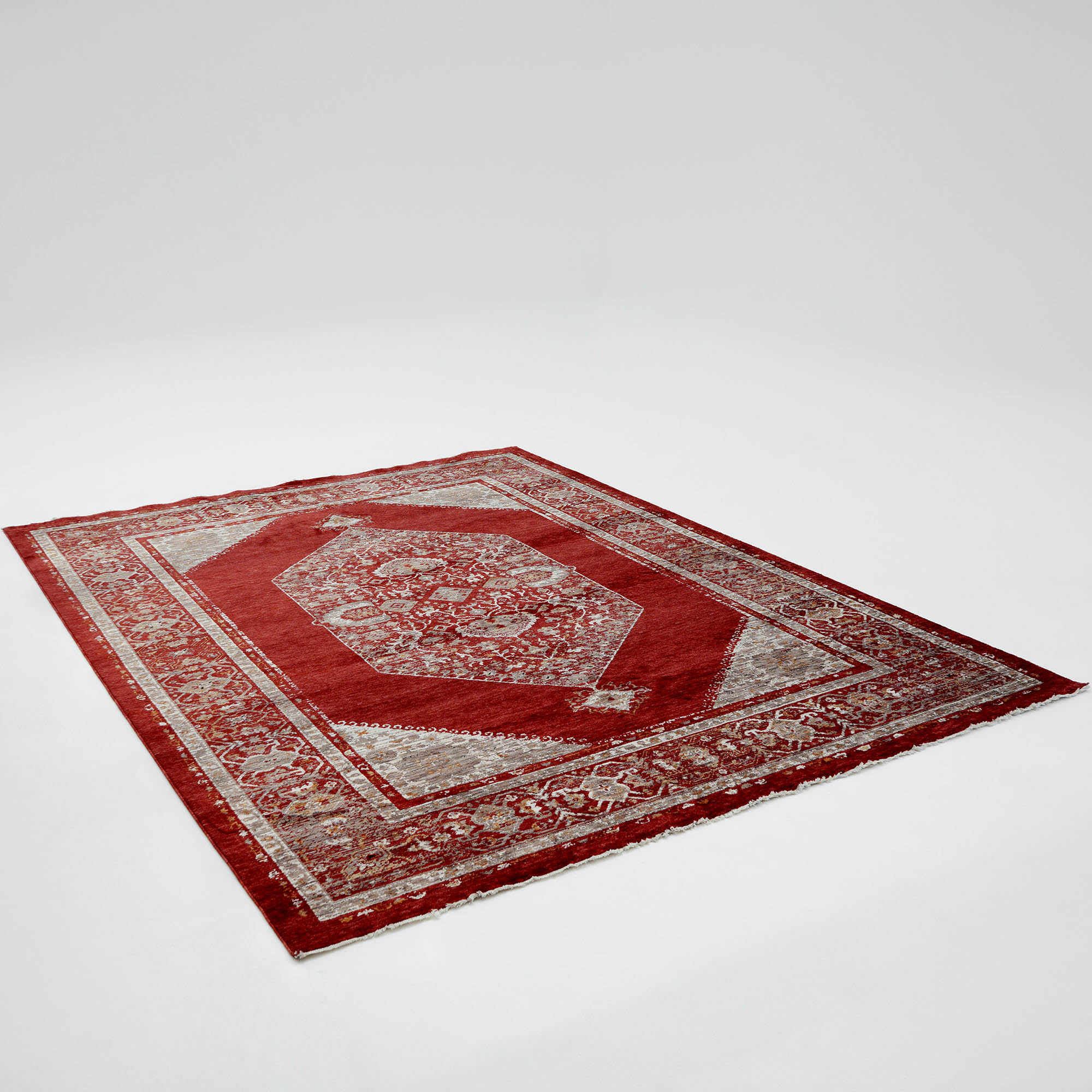 The RAMSHA HOME Luxurious Texture Turkey Multi Color Machine Made Rug - K643C features a rectangular design with intricate red and beige patterns, shown against a plain white background.