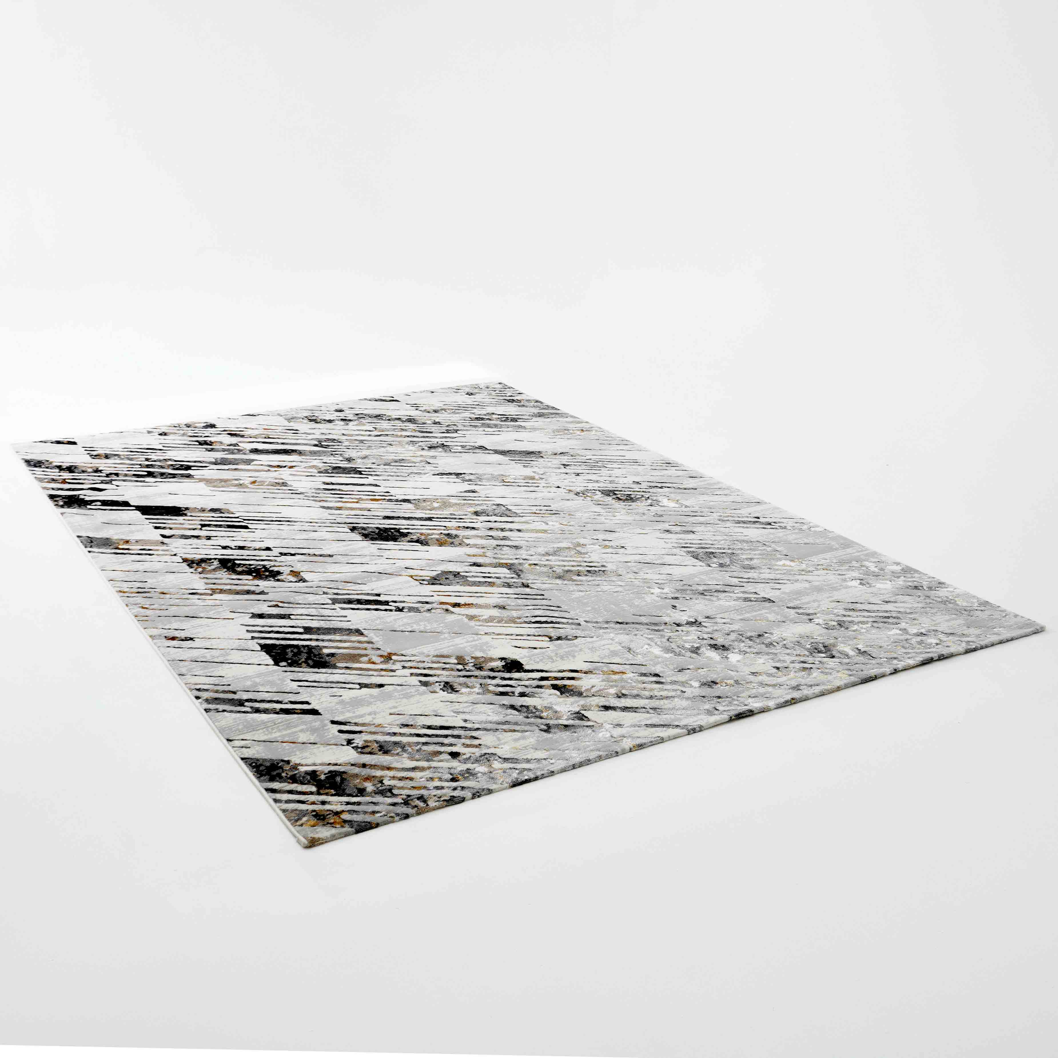 The RAMSHA HOME Turkey Cream Colored Rug MZ36B is a rectangular, machine-made polyester rug with an abstract linear pattern in gray, black, and white on a cream background.