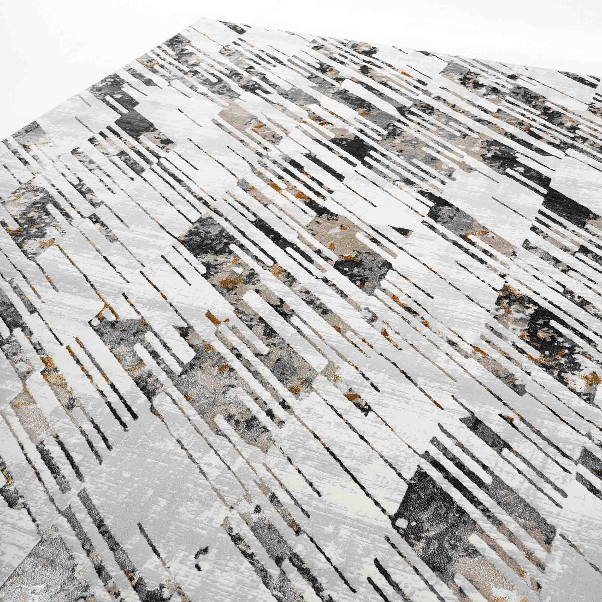The RAMSHA HOME Turkey Cream Colored Rug MZ36B showcases a modern geometric pattern in gray, black, gold, and white hues. Crafted from durable machine-made polyester, it's a chic area rug that adds a stylish touch to any space.