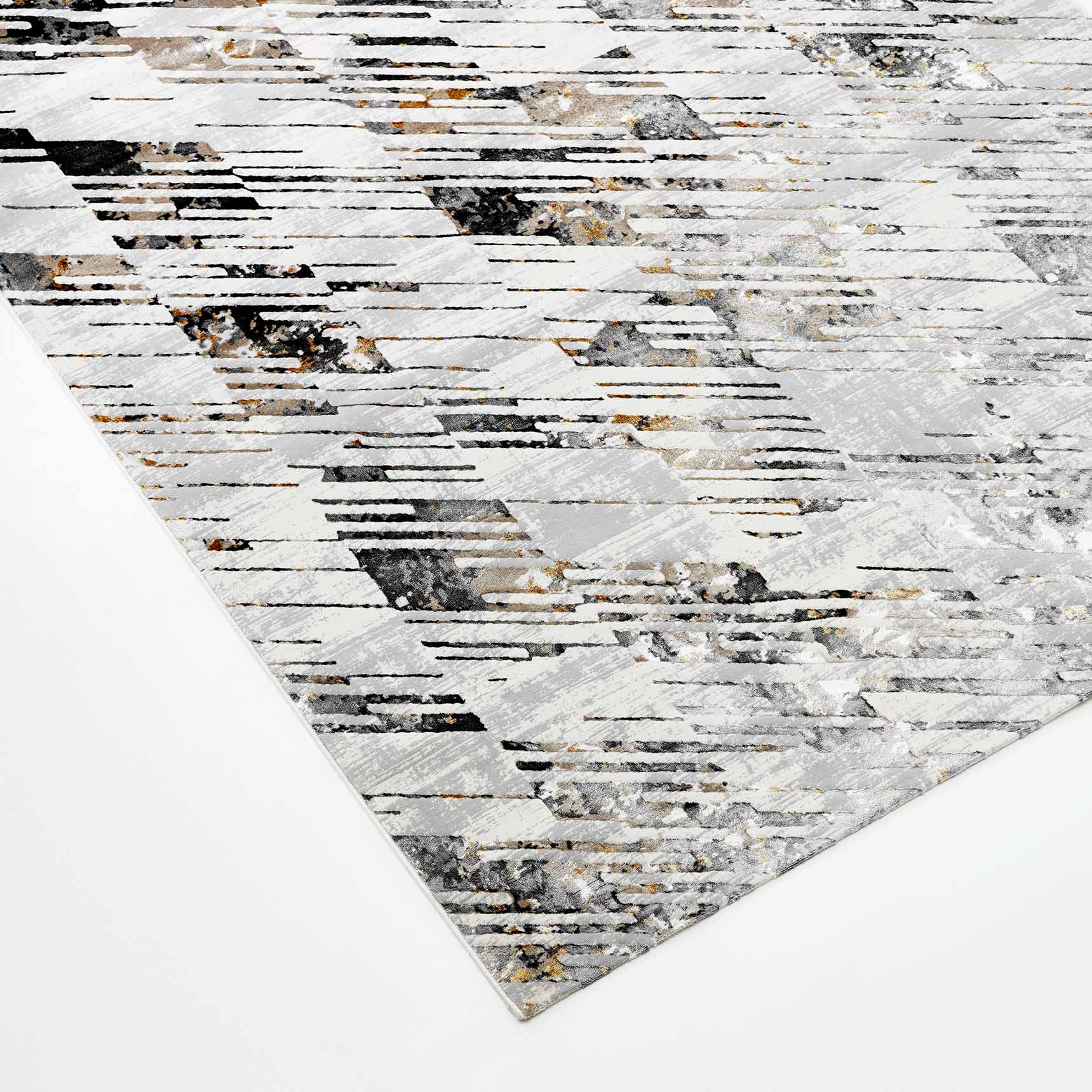 The RAMSHA HOME Turkey Cream Colored Rug MZ36B features a geometric pattern in shades of gray, black, white, gold, and beige. Machine-made from polyester for durability, this modern rug offers a stylishly distressed look for any room.