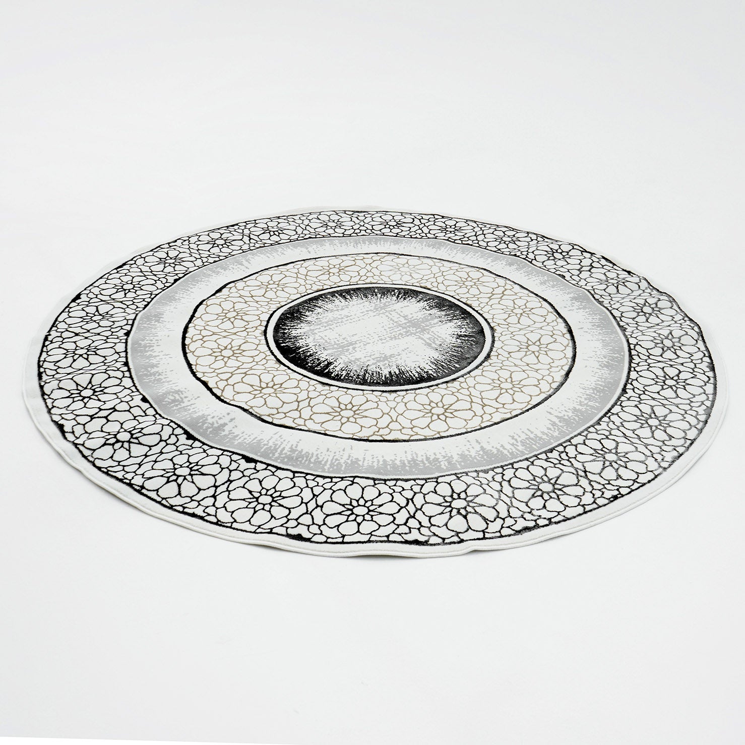 The RAMSHA HOME Grey Color ND81A BARCELONA Decor Area Rug features concentric circular patterns and intricate lace-like designs with a subtle floral border, adding modern elegance to any light-colored floor.