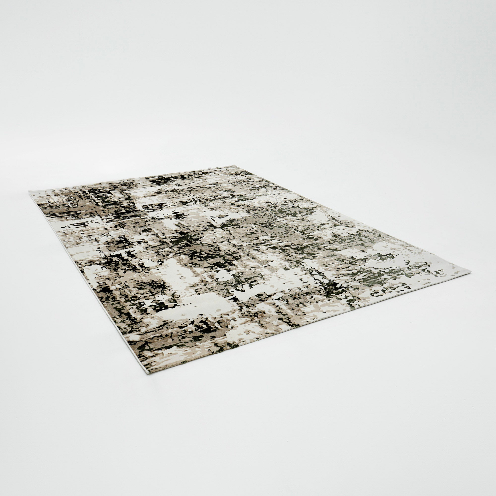 The RAMSHA HOME Multi Colored Geometry Turkish Carpet MZ61E is a machine-made rectangular rug with an abstract, mottled design in beige, gray, and black on a plain white background.