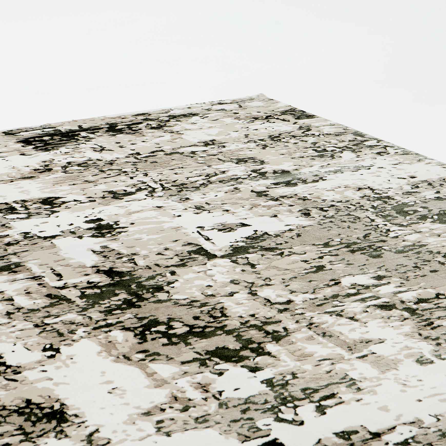 The RAMSHA HOME Multi Colored Geometry Turkish Carpet MZ61E, a machine-made rug with an abstract textured pattern in beige, gray, and black hues, is shown against a white background.