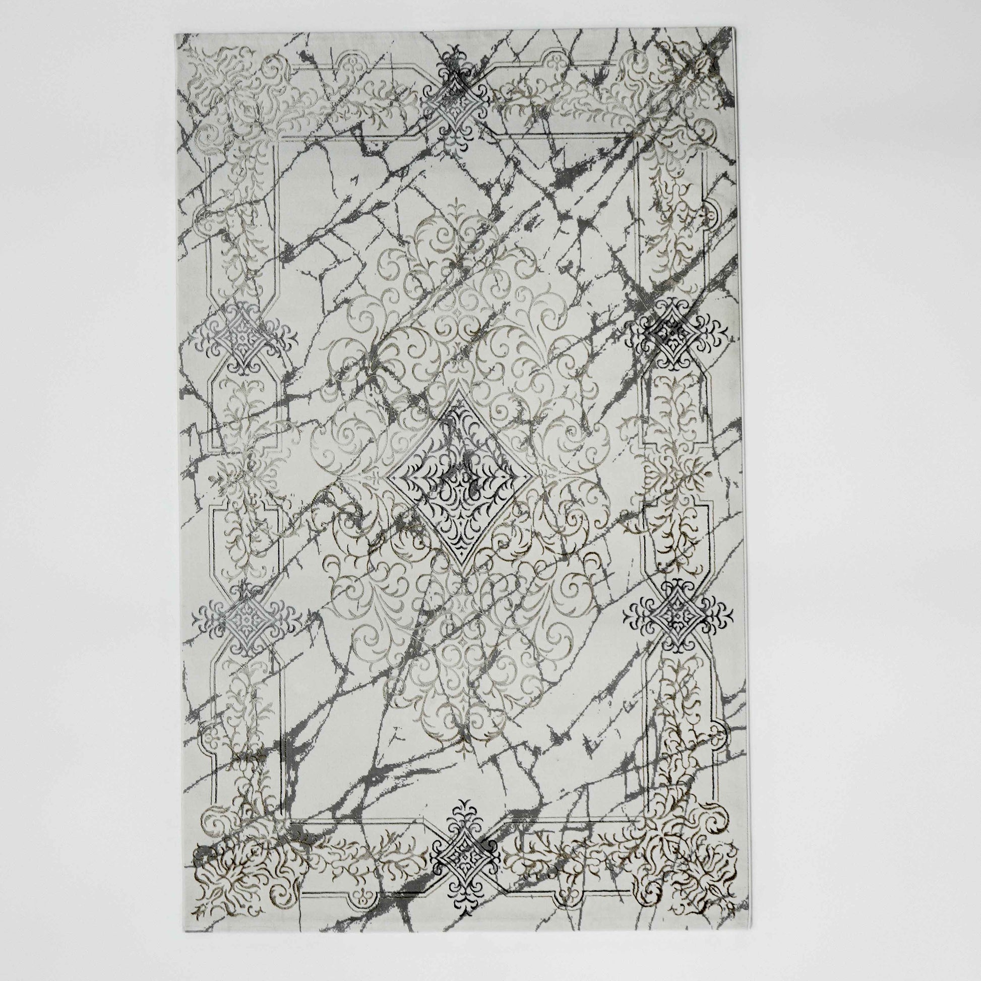 The RAMSHA HOME Beige Color Polyester NK33C Area Rug features a modern rectangular design with an ornate gold pattern on a white background, accented by black marble streaks and a central diamond motif.