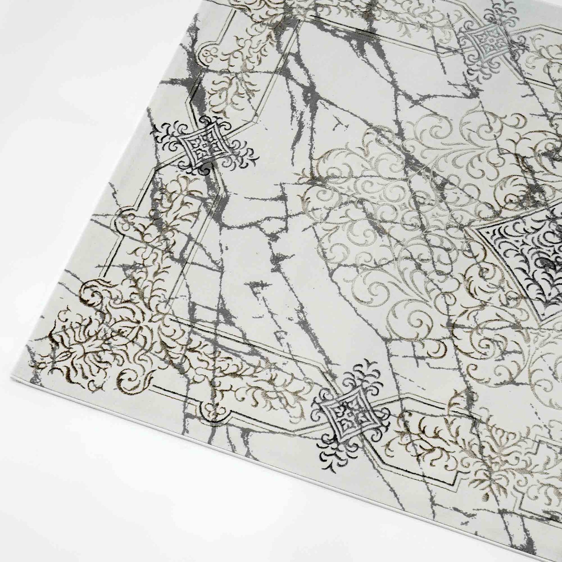 The RAMSHA HOME Beige Color Polyester NK33C Area Rug features a decorative marble pattern in gray and white, accented by ornate gold and black flourishes, blending modern classic elegance with timeless style.