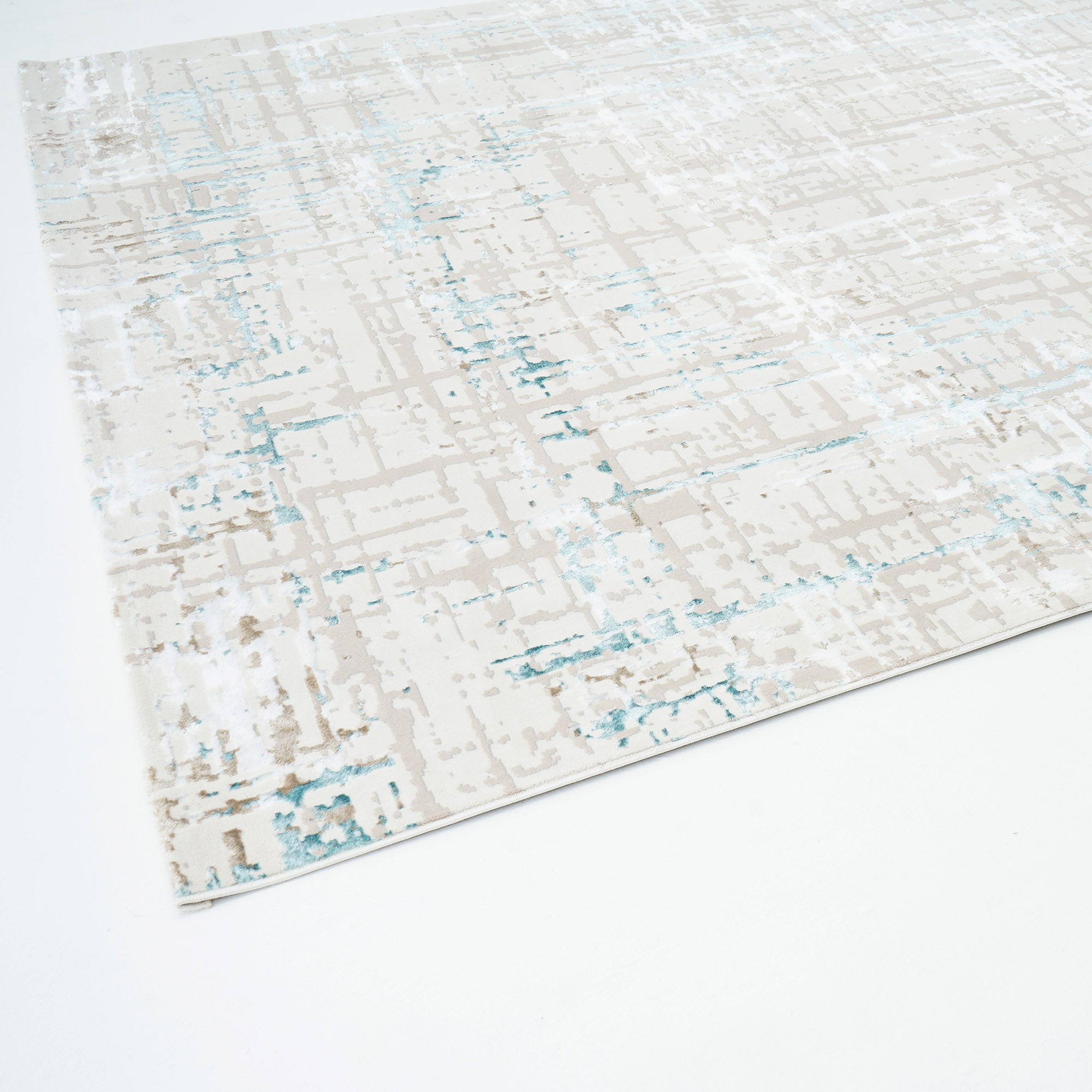 The RAMSHA HOME Cream Colored Turkish Carpet MZ24G BARCELONA is a rectangular abstract area rug with a modern pattern in beige, white, and light blue tones, shown on a white background.