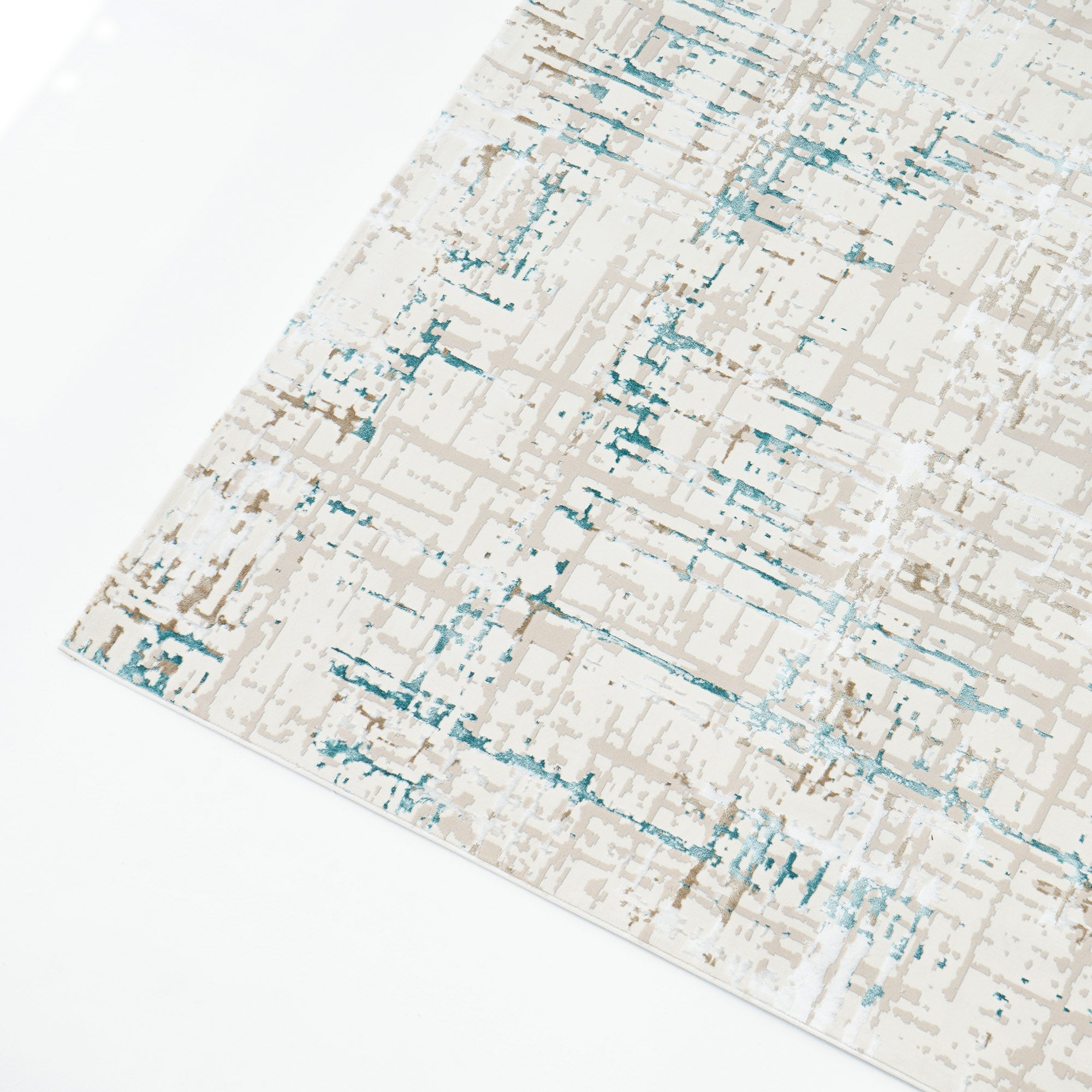 A close-up of the Cream Colored Turkish Carpet MZ24G BARCELONA by RAMSHA HOME, featuring an abstract geometric design in beige, cream, and blue tones on a white background.